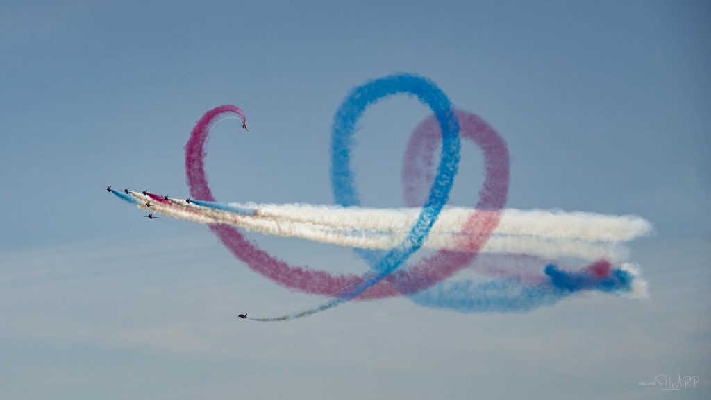 The Red Aroows performing at an Airshow