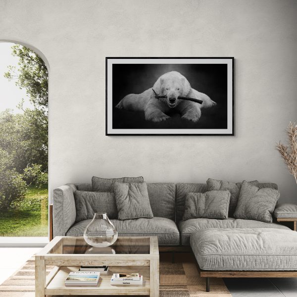 A black and white draw on photo fine art limited edition print. Polar bear with a stick in his mouth. Living room